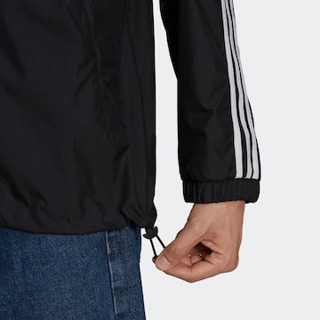 Geacă de primăvară-toamnă 'Adicolor Classics 3-Stripes ' de la ADIDAS ORIGINALS pe negru