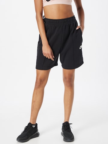 Loosefit Pantaloni de la Nike Sportswear pe negru: față