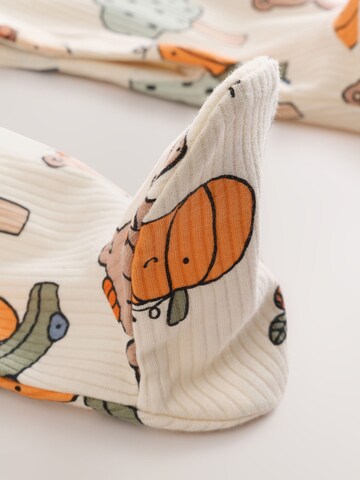 Pigiama di Next in beige