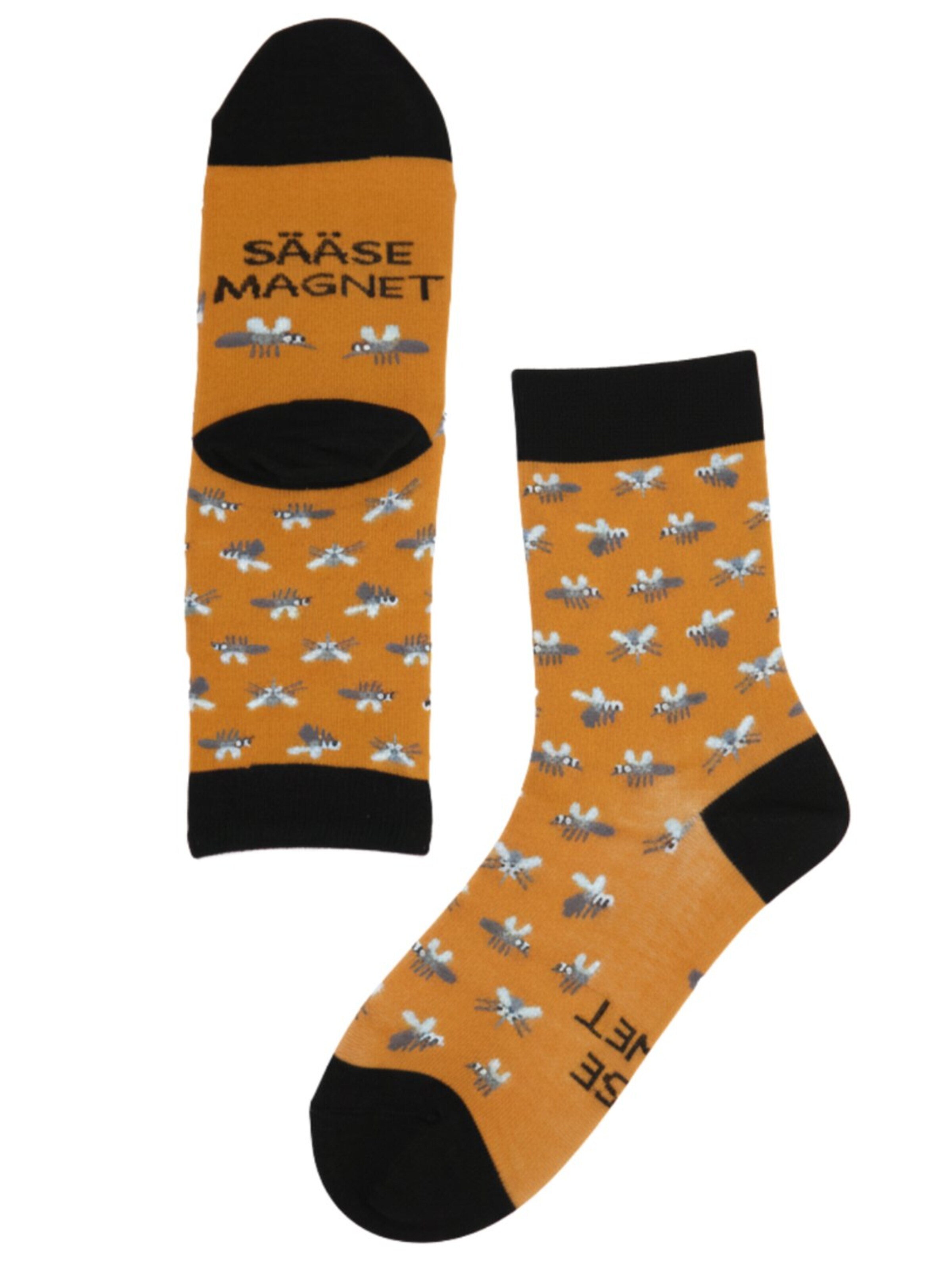 Sokisahtel Socks 'SÄÄSEMAGNET cotton socks with a message' in Yellow: front