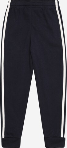 ADIDAS SPORTSWEAR Tapered Urheiluhousut 'Essentials 3-Stripes' värissä musta