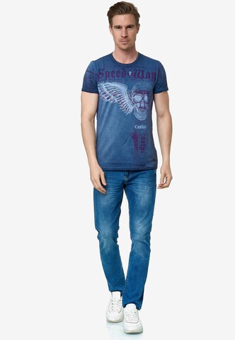 Rusty Neal T-Shirt mit 'Flying Skull' Front Print in Blau
