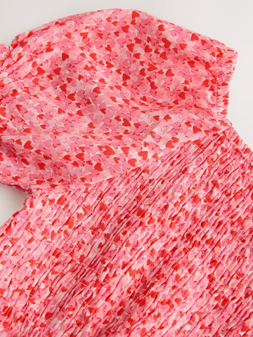 Ensemble Next en rose