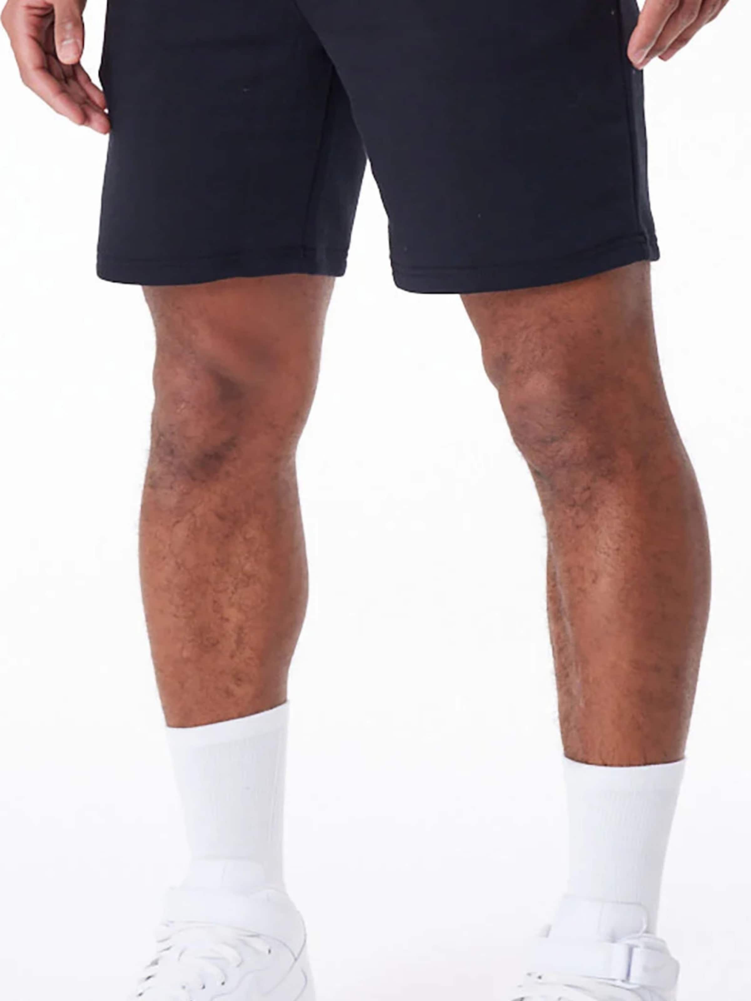 regular Pantaloni sportivi 'New Era Essentls Short' di NEW ERA in nero