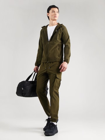 Giacca sportiva di UNDER ARMOUR in verde