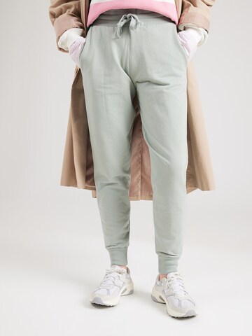 ABOUT YOU Tapered Trousers 'Teena' in Green: front