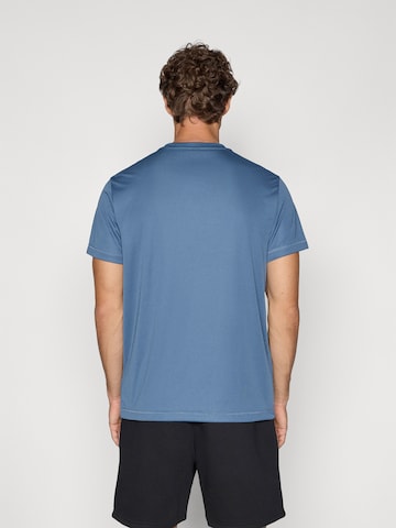 Tricou funcțional 'ID TRAIN' de la Reebok pe albastru