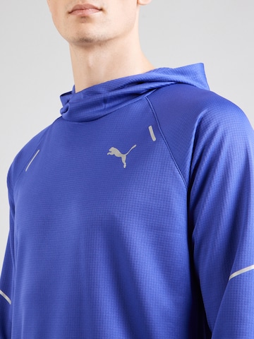 PUMA Spordidressipluusid 'Run Grid', värv sinine