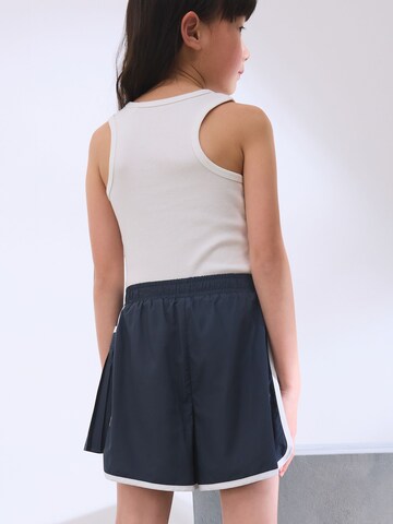 Haut Next en blanc