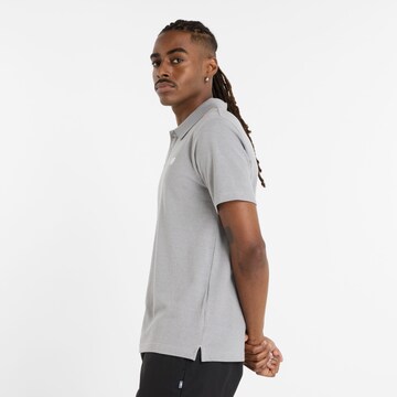 new balance Poloshirt in Grau