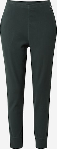 PUMA Tapered Sports trousers 'Exhale' in Green: front