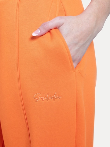 Loosefit Pantalon 'Siara' Smilodox en orange