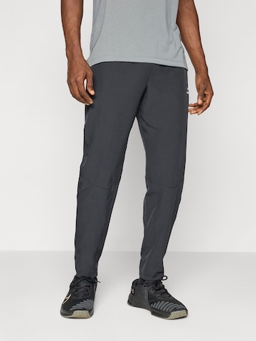 NIKE Alt kitsenev Spordipüksid 'Pro', värv must: eest vaates