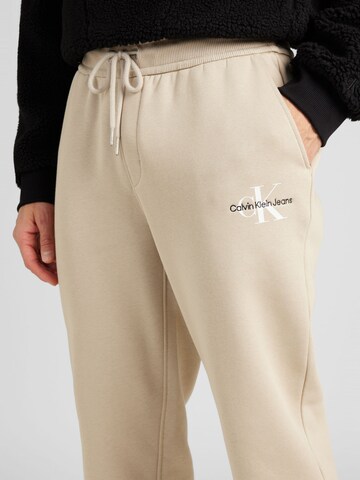 Calvin Klein Jeans Tapered Pants in Beige