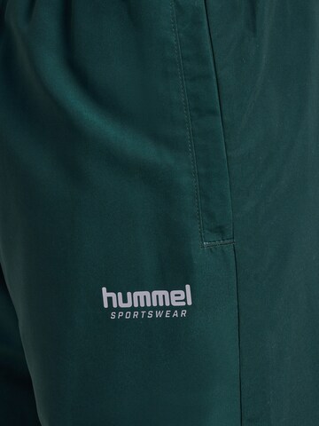 Hummel - Tapered Pantalón deportivo en verde