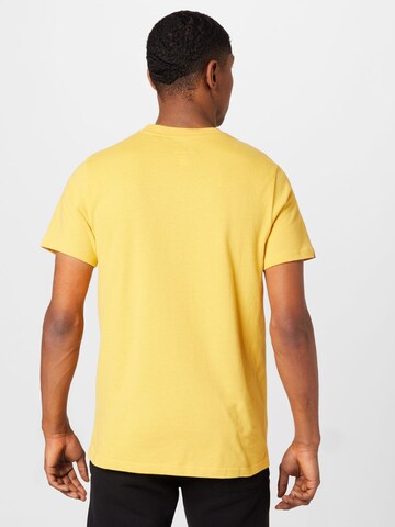 Superdry Тениска в жълто