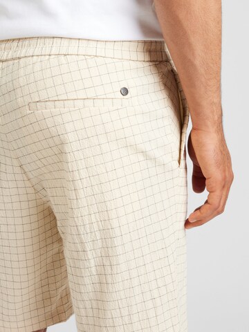 Clean Cut Copenhagen Regular Shorts 'Barcelona Miguel Seersucker' in Beige