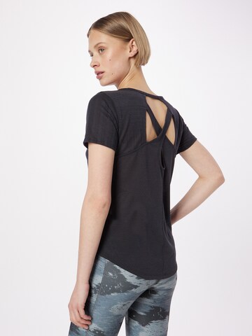 UNDER ARMOUR Funktionsshirt 'Streaker' in Schwarz