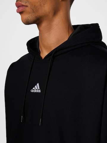 ADIDAS SPORTSWEAR - Camiseta deportiva en negro