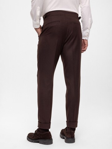 Antioch Tapered Pleat-front trousers in Brown