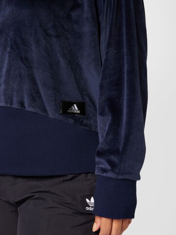 ADIDAS SPORTSWEAR Sportsweatshirt 'Holidayz Cozy Velour ' i blå