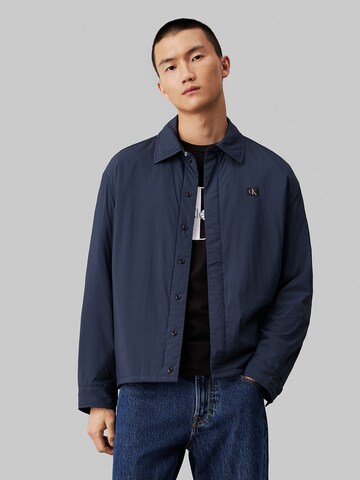 Calvin Klein Jeans Between-season jacket in Blue: front