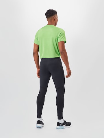 NIKE Skinny Sportbroek 'Phenom' in Zwart