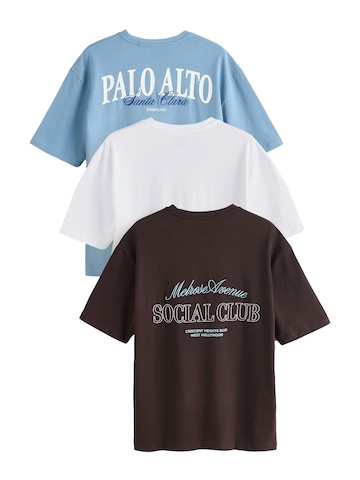 T-Shirt Next en bleu : devant