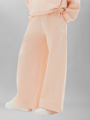 Wide Leg Pantalon Calvin Klein Jeans en orange : devant
