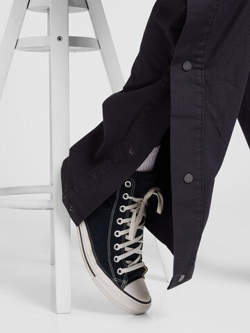 Regular Pantaloni 'Reid243' de la HUGO pe negru