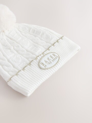 Bonnet Baker by Ted Baker en beige