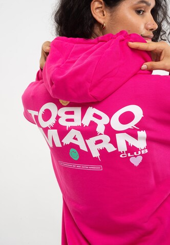 Sweat-shirt Tom Barron en rose