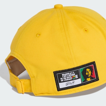 Cappello da baseball sportivo 'Jamaika 26 x Bob Marley Baseball' di ADIDAS PERFORMANCE in giallo