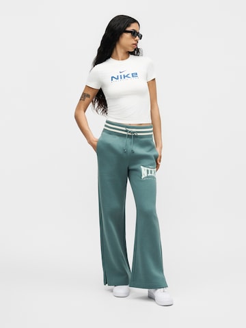 Nike Sportswear Szeroka nogawka Spodnie 'PHX' w kolorze zielony