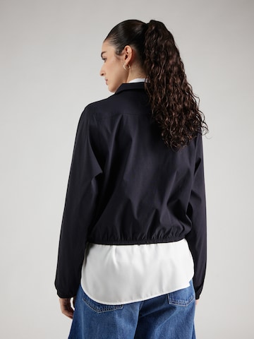 Veste mi-saison 'Unstoppable' UNDER ARMOUR en noir