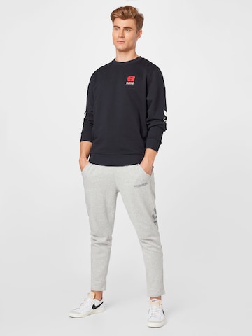 Hummel Конический (Tapered) Спортивные штаны 'Legacy' в Серый