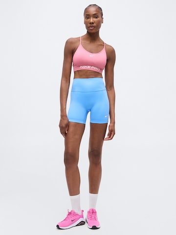 NIKE - Soutien Bustier Soutien de desporto 'Nike Pro' em rosa