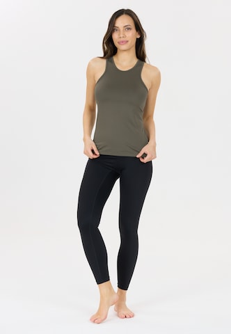 Athlecia Sports top 'Almi' in Brown