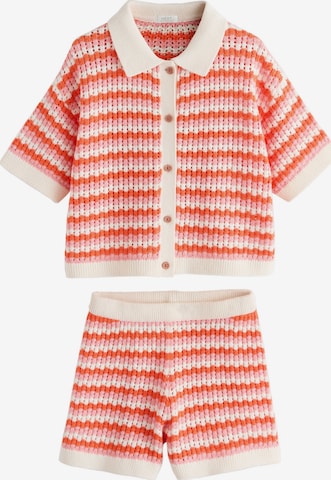 Next Setti värissä oranssi: etupuoli