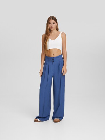 Bershka Wide leg Pleat-front trousers in Blue