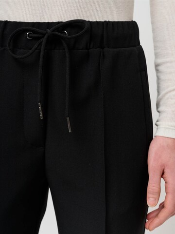 BRUUNS BAZAAR Tapered Trousers with creases 'RubySus Livia' in Black