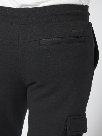 Effilé Pantalon cargo KOROSHI en noir