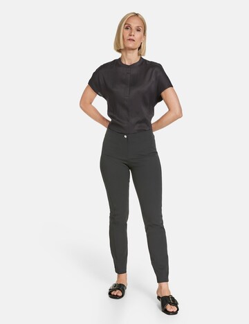 GERRY WEBER Skinny Hlače | črna barva