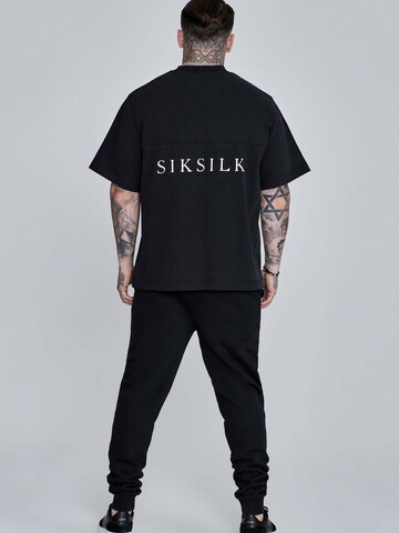 SikSilk Slimfit Sporthose 'Essentials' in Schwarz