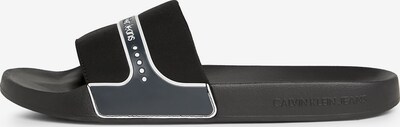 Calvin Klein Jeans Claquettes / Tongs en noir / blanc, Vue avec produit