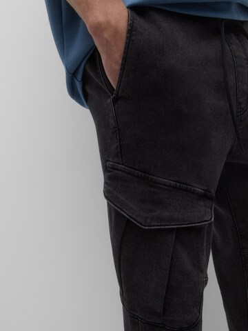 Pull&Bear Tapered Cargo jeans in Black