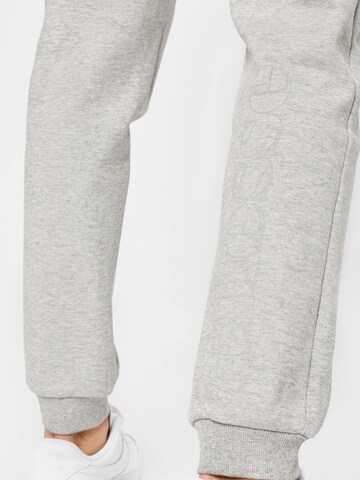 ELLESSE - Tapered Pantalón deportivo 'Kylian' en gris