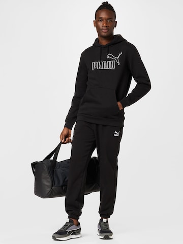 Tapered Pantaloni di PUMA in nero