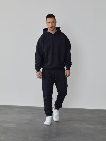 DAN FOX APPAREL Tapered Jogginghose 'Danilo' (GOTS) in Schwarz