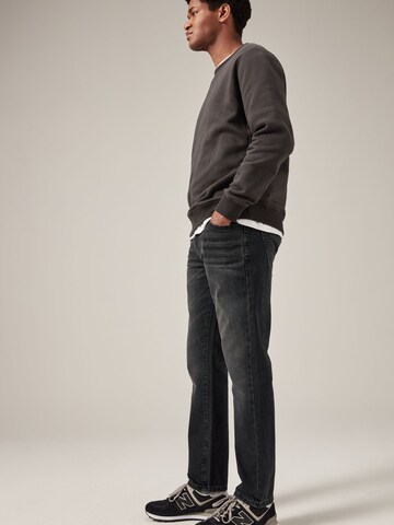 Next Slimfit Jeans i grå
